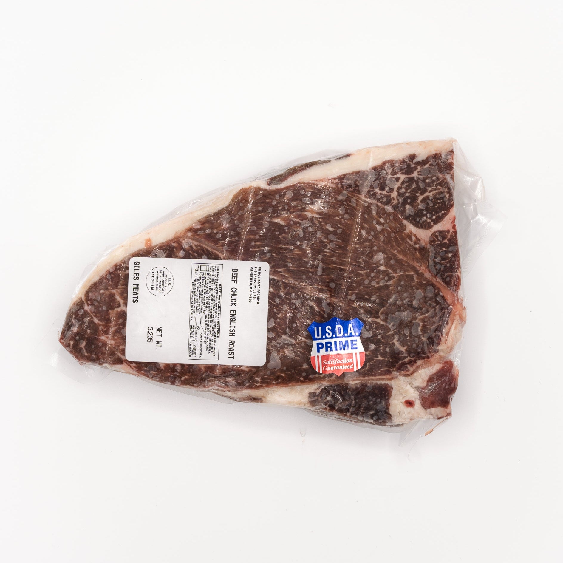 USDA Prime labeled english roast frozen beef on a white background